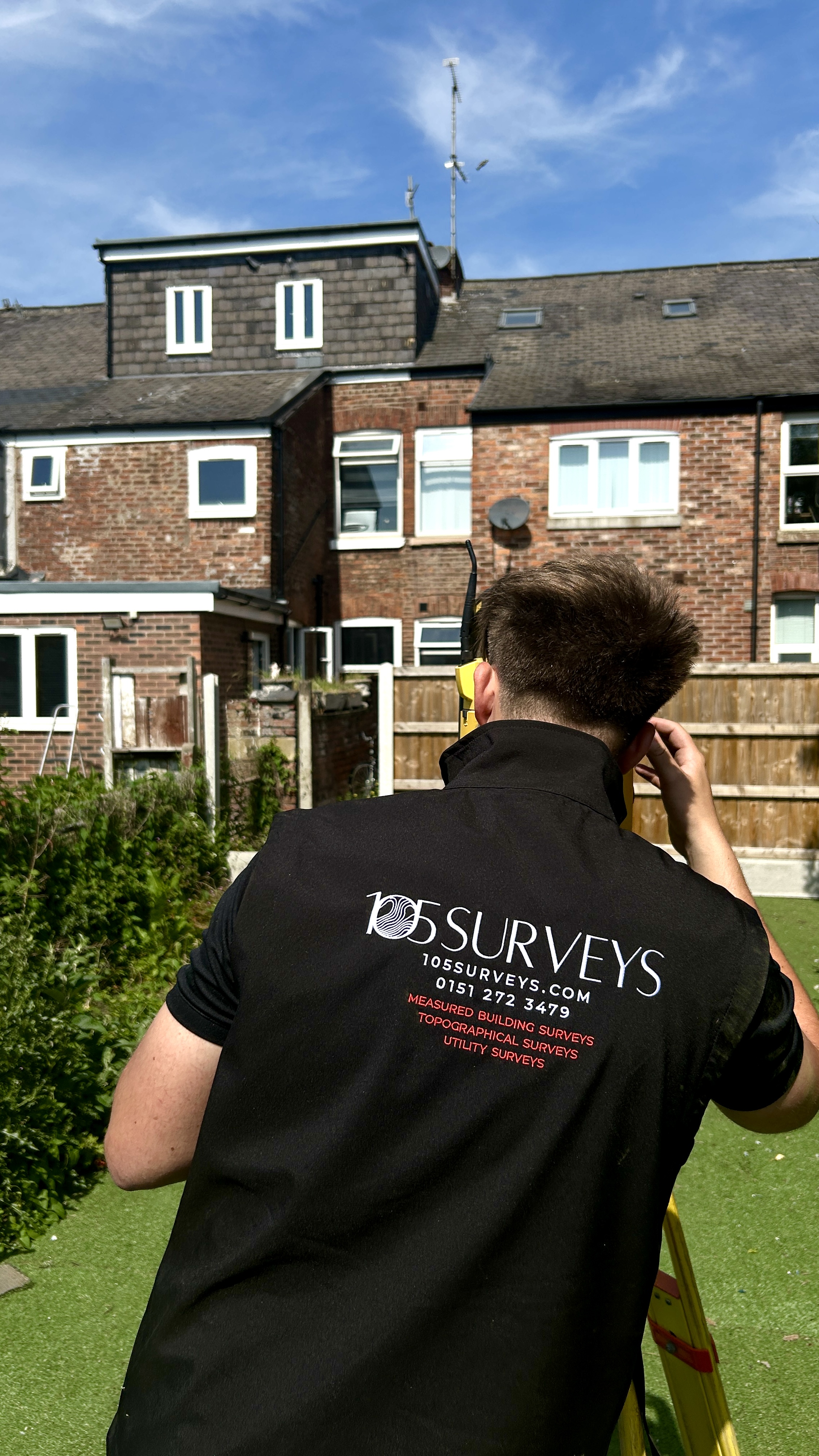 105 Surveys surveyor on site conducting a topographical survey in the North West